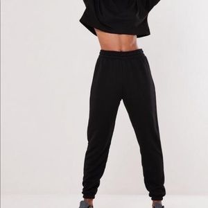 Black Missguided joggers.